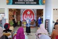 Pj Ketua TP PKK Kota Sabang Kamelia Nasri saat berikan sambutan di Pelabuhan Balohan Sabang