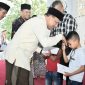 Bupati Bireuen, H Mukhlis ST menyantuni anak yatim