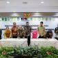 Penandatanganan komitmen bersama antara peserta rapat koordinasi dan pihak KPKsebagai simbol sinergi antara legislatif, eksekutif, dan KPK dalam menciptakan tata kelola pemerintahan daerah yang bersih, transparan, dan akuntabel di Gedung Merah Putih, Jakarta