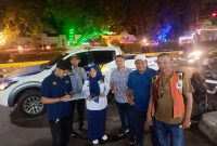 Petugas Dinas Perhubungan Bireuen survei lokasi lahan parkir diseputaran pusat Kota Bireuen.