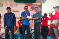 Pelatih dan atlit PASI Bireuen meraih juara III lomba Marathon Dewantara 10K, Minggu (23/8).